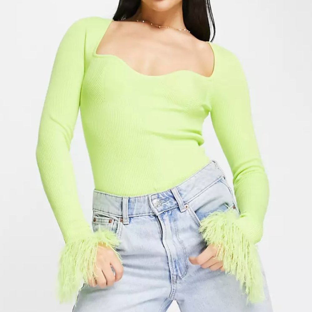 Knitted top with sweetheart neck and faux feather trims in lime yellow